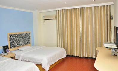 源鑫宾馆豪华标准双人房 舒适体验与周到服务的完美融合